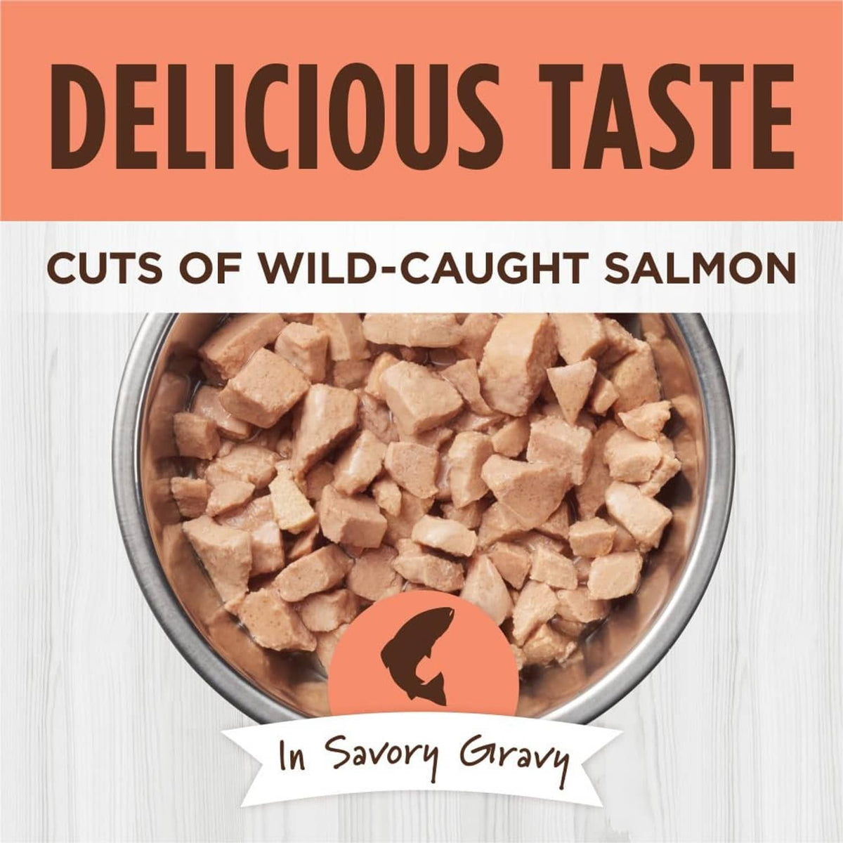 Savory gravy salmon cat food topper pieces shown in a bowl