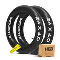 Pair of black heavy-duty bike inner tubes with yellow valve stems and HEB box