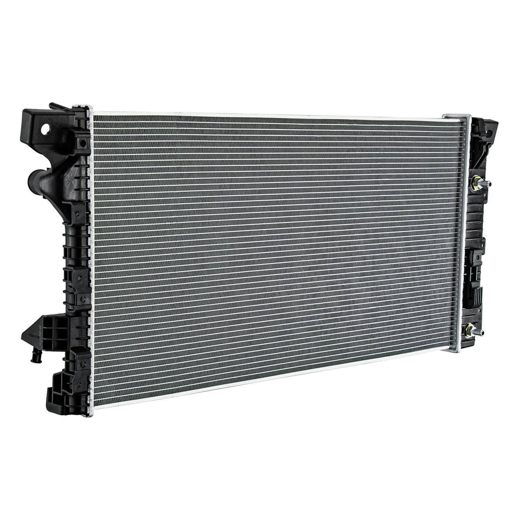 Automotive radiator, angled view, showing silver fin core and black side mounting tabs