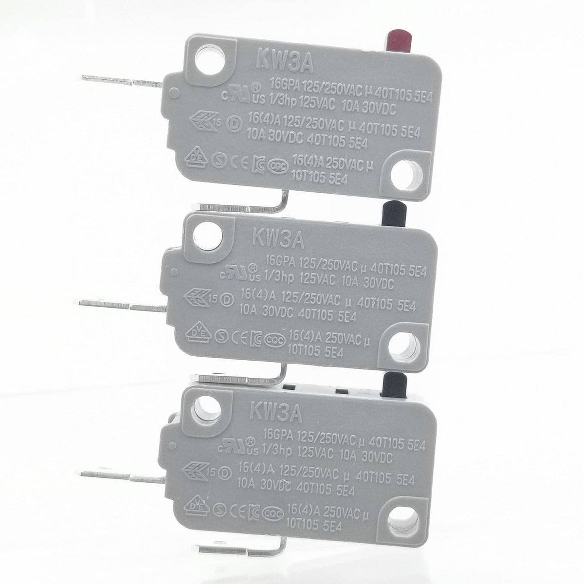 Multiple microwave door interlock switches with gray housings and metal actuator pins