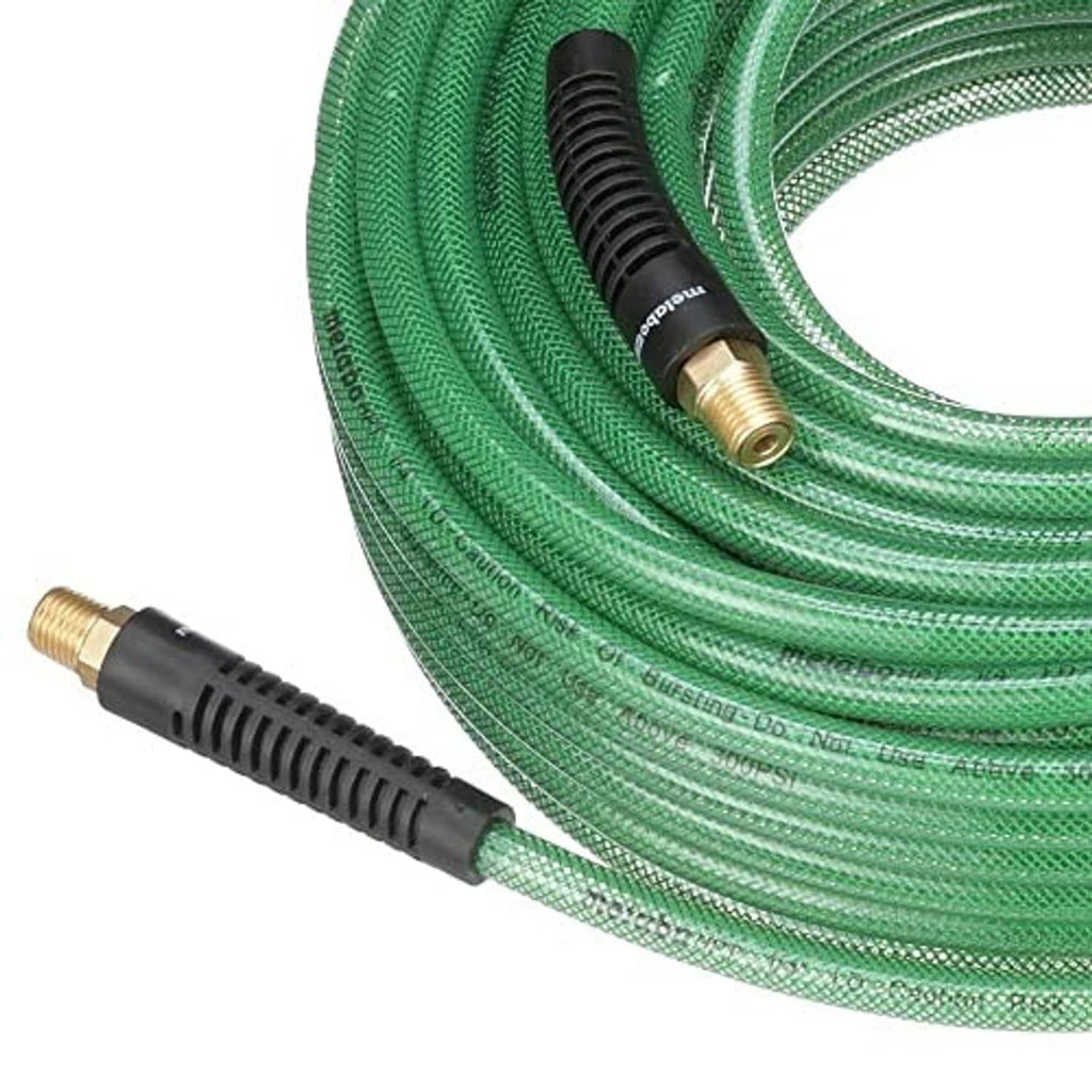 Close-up of green polyurethane air hose end with brass fitting and black hose grip.