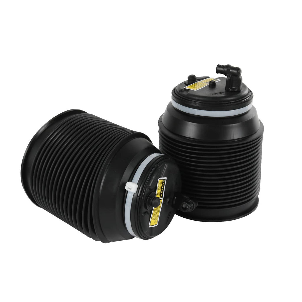 Two black air suspension spring bags, side view with white sealing band and valve tops.