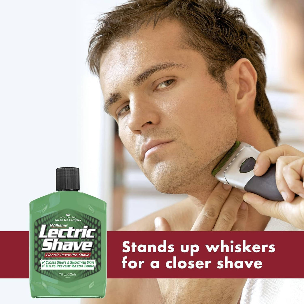 Electric razor pre-shave bottle beside man shaving with an electric trimmer