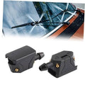 Two-piece black windshield washer nozzles with 4-hole spray ports and brass inlet fittings
