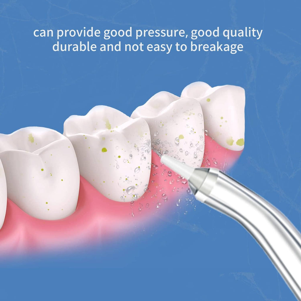 Water flosser jet tip with metal nozzle spraying across teeth surface