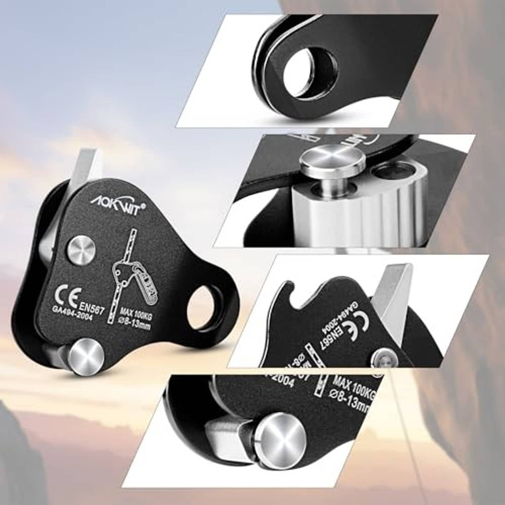 Black rope grab belay device with silver lever and cylindrical attachment points