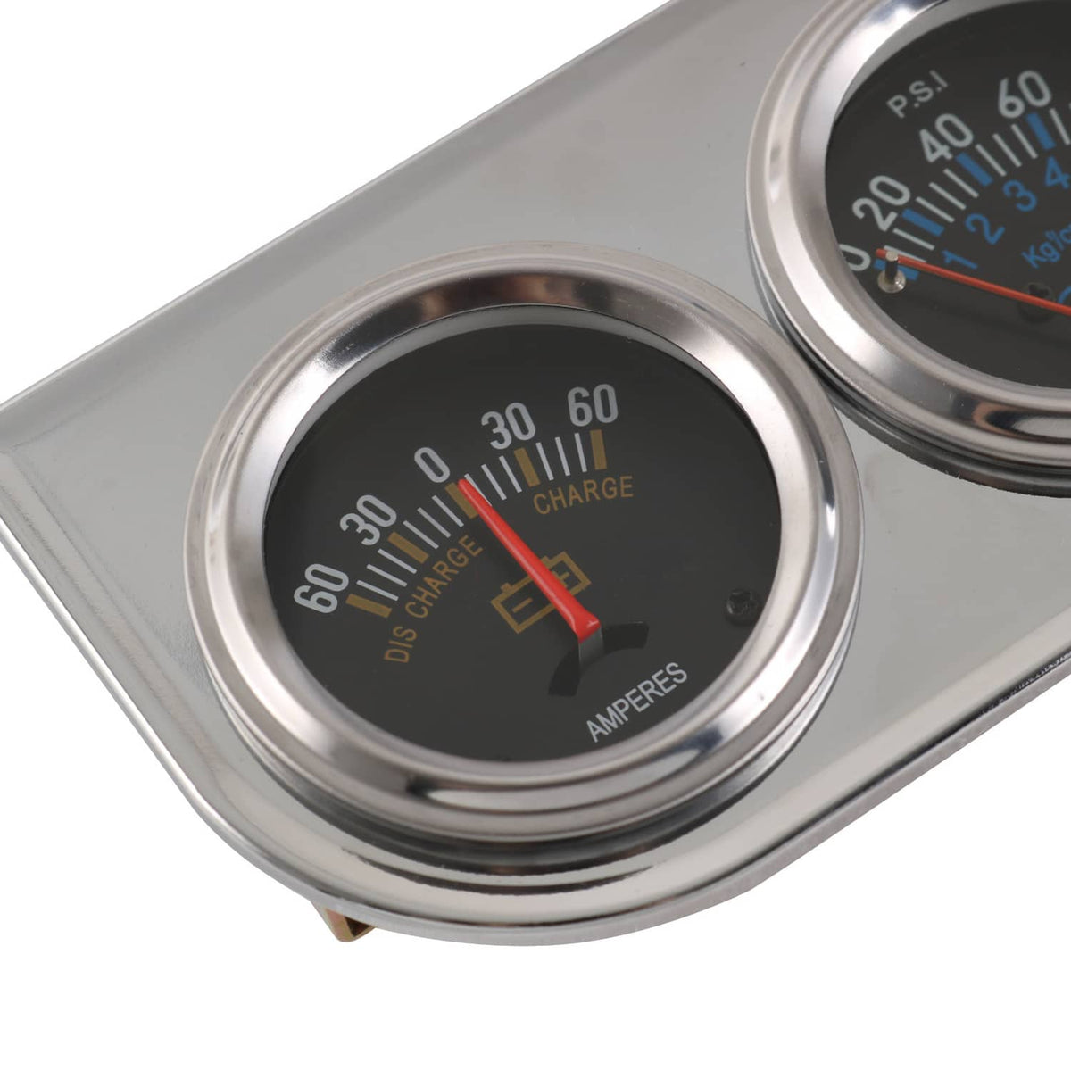 Close-up of left amperage gauge on chrome triple car panel