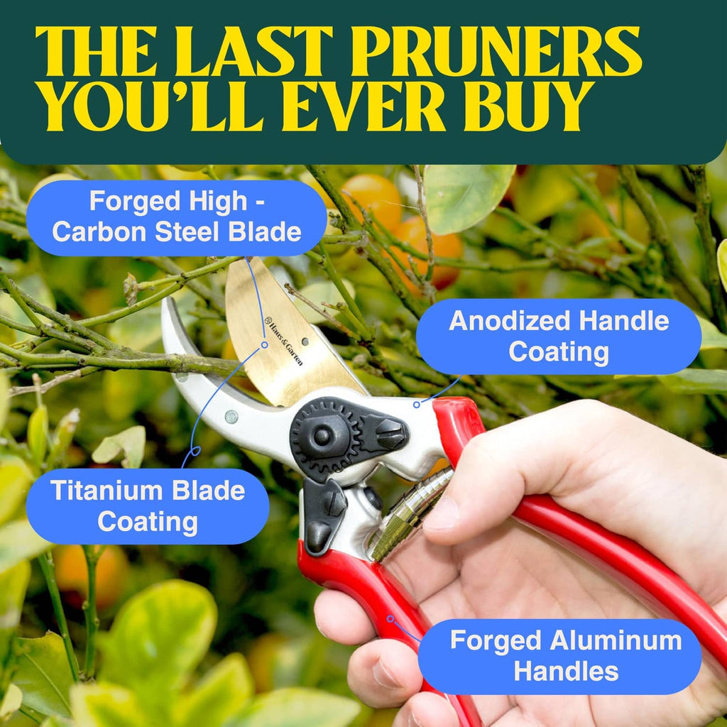 Red-handled hand pruner with gold blade and black cutting gear, held in hand