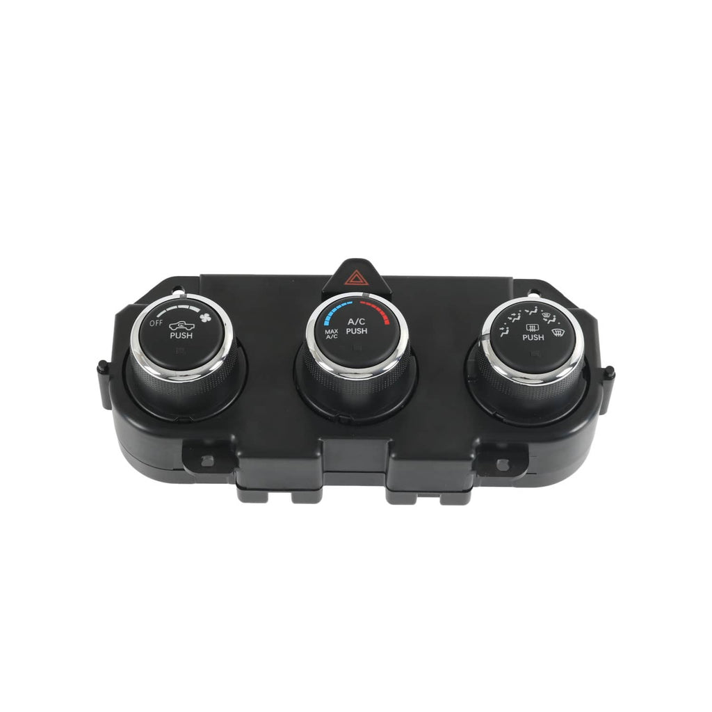 AC climate control panel front view with chrome rings around three dial knobs.