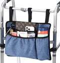 Blue denim walker bag with multiple pockets and cup holder, black trim