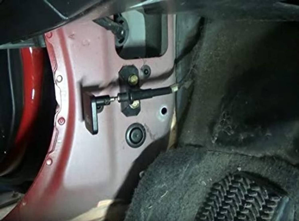 Latch release handle and cable repair hardware mounted at vehicle latch area