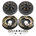 Pair of electric brake drum hub assemblies with mounting studs and backing plates