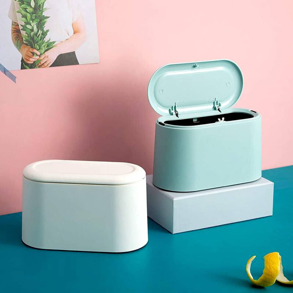 Light blue mini trash can with open lid on a tabletop display