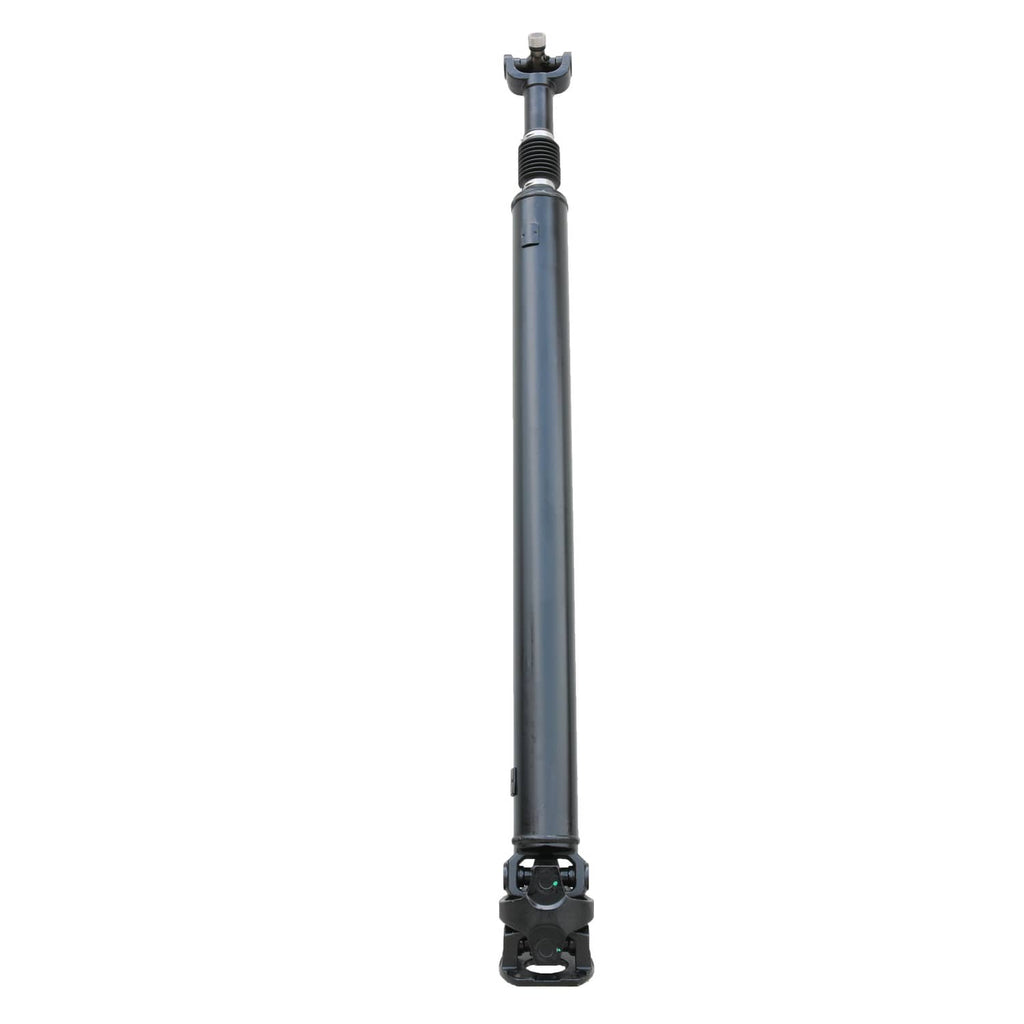 Rear driveshaft assembly in full length view, dark steel tube with yoke ends