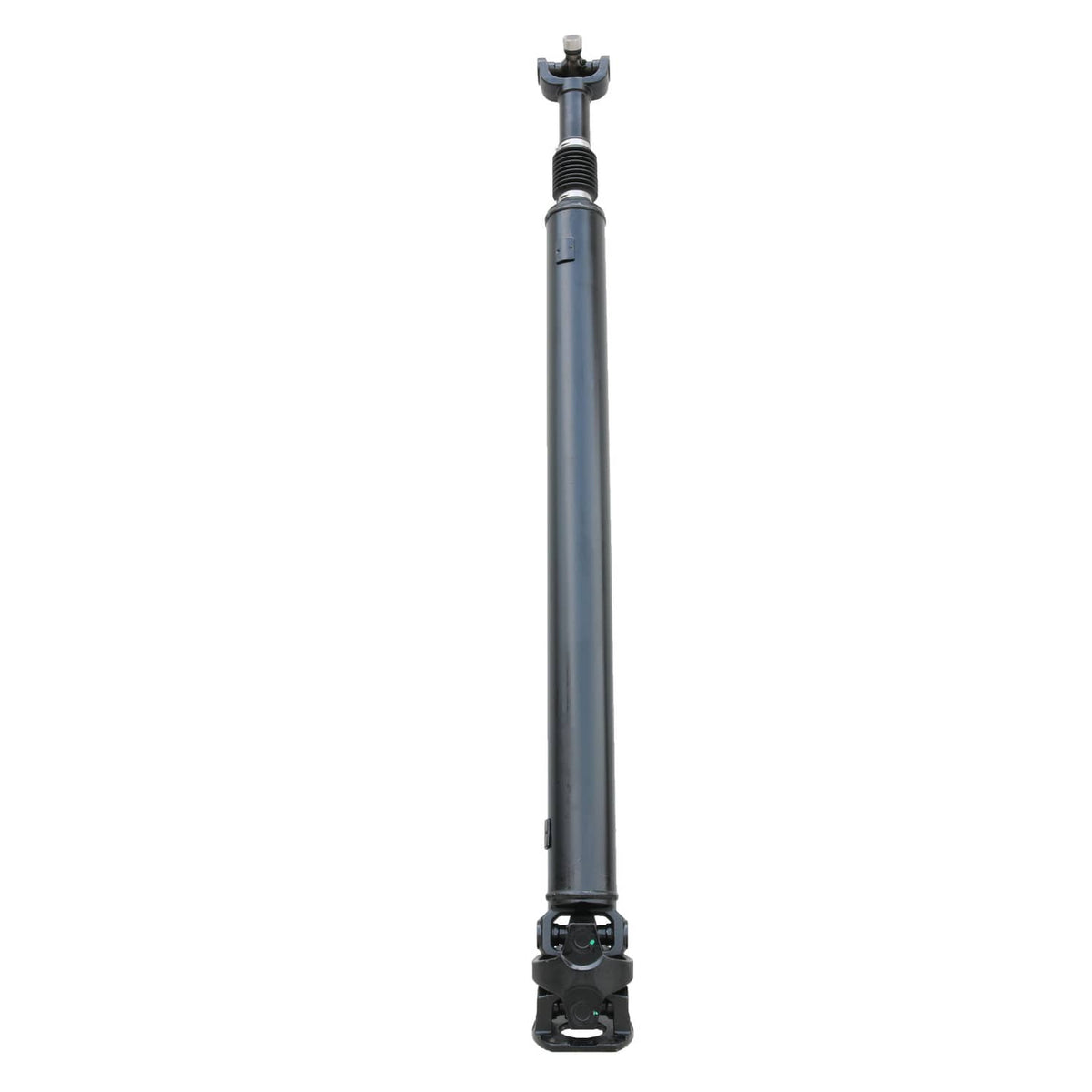 Rear driveshaft assembly in full length view, dark steel tube with yoke ends
