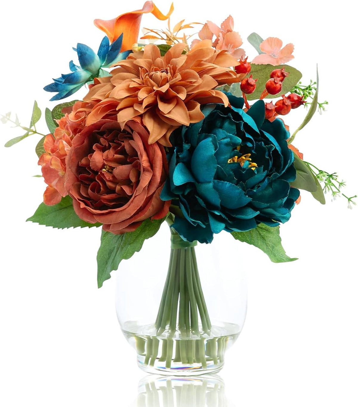 Clear glass vase with teal and orange faux peony-dahlia bouquet and green leaves