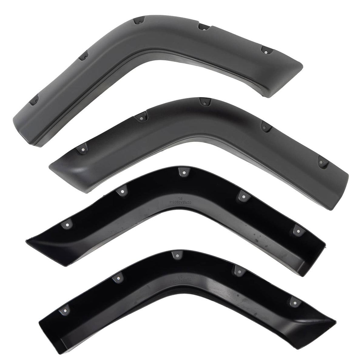 Stacked black fender flare extensions with mounting clips and drilled holes