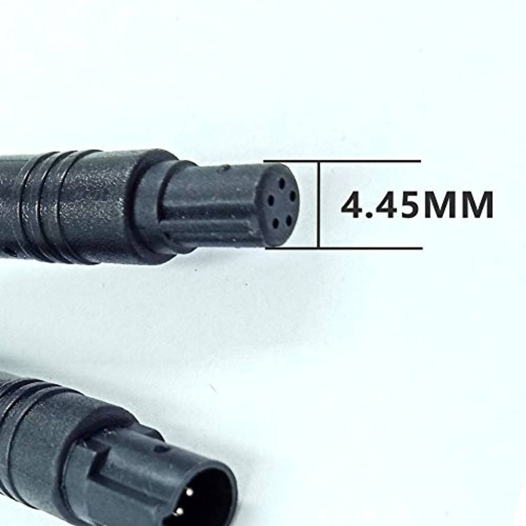 Close-up of black dash cam cable plug tip with small 4-pin port