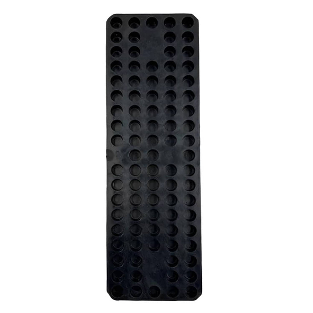 Black rubber tire changer pad with grid of traction bumps and mounting holes