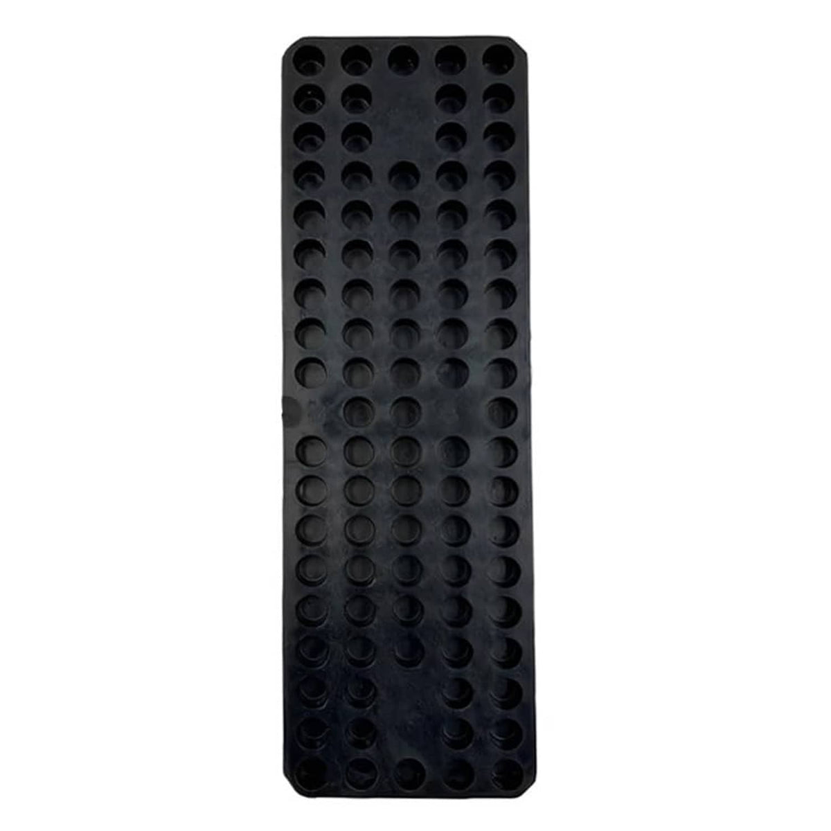 Black rubber tire changer pad with grid of traction bumps and mounting holes
