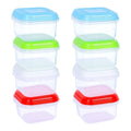 Stacked set of reusable baby food containers with blue, green, and red lids