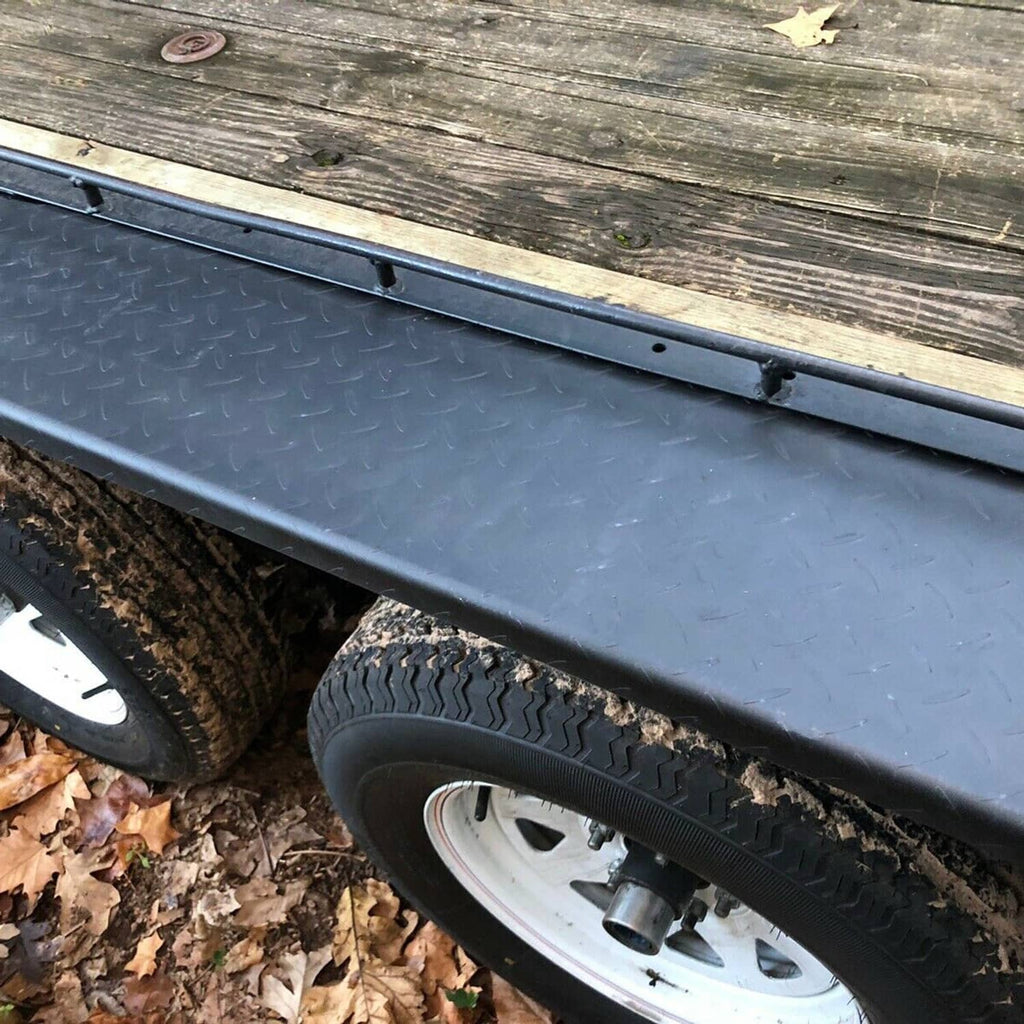 Dark gray steel diamond tread trailer fender with side cutout and mounting holes