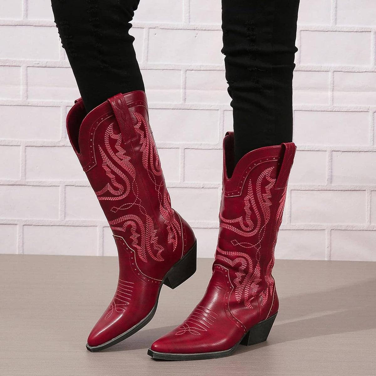Women’s mid-calf cowboy boots in dark red with pull tabs and western embroidery