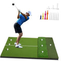 Green golf hitting mat with white ball tees and marker spots, rectangular surface
