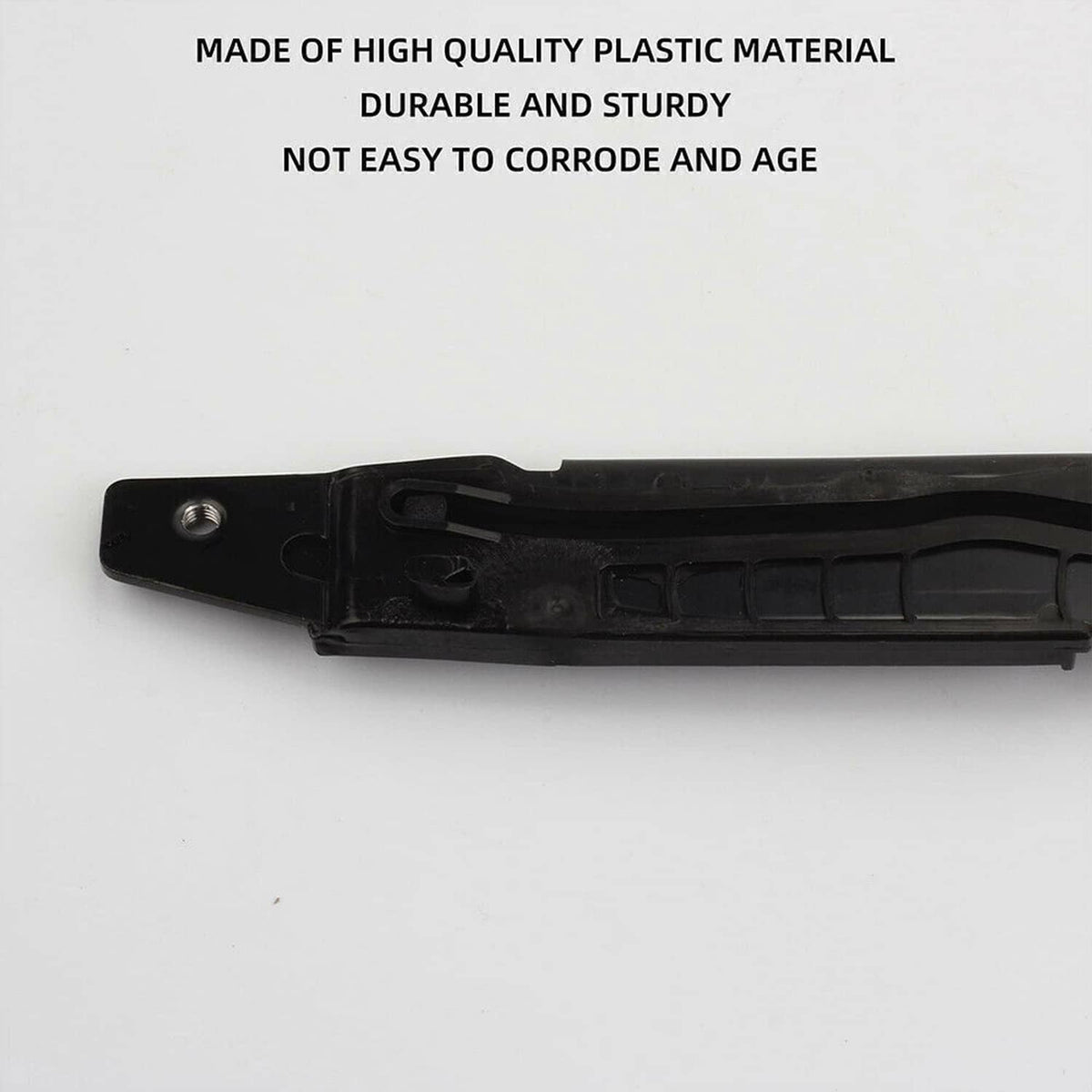 Close-up of black sunroof track guide rail end bracket and mounting hole