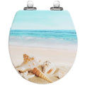 Round toilet seat with molded beach shell and ocean design, light blue and white