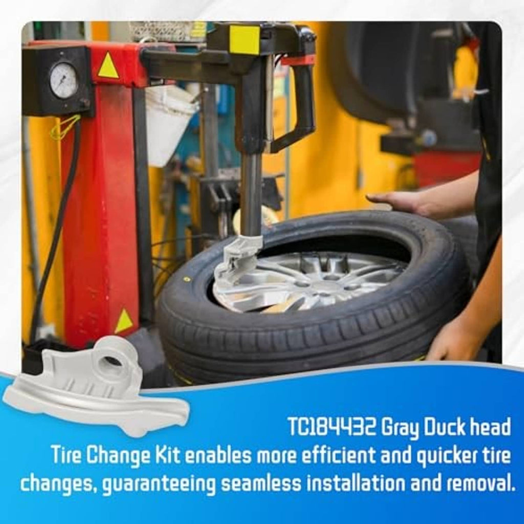 Low-profile nylon tire demount head kit positioned on tire changer with mounted tire