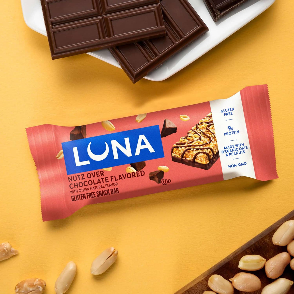 LUNA Nuts Over Chocolate snack bar in red wrapper with chocolate squares