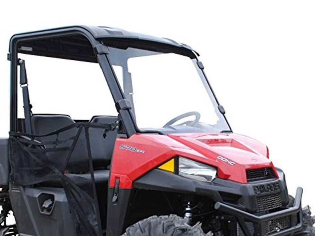 Clear full windshield with black supports and mounted clamps on red off-road UTV