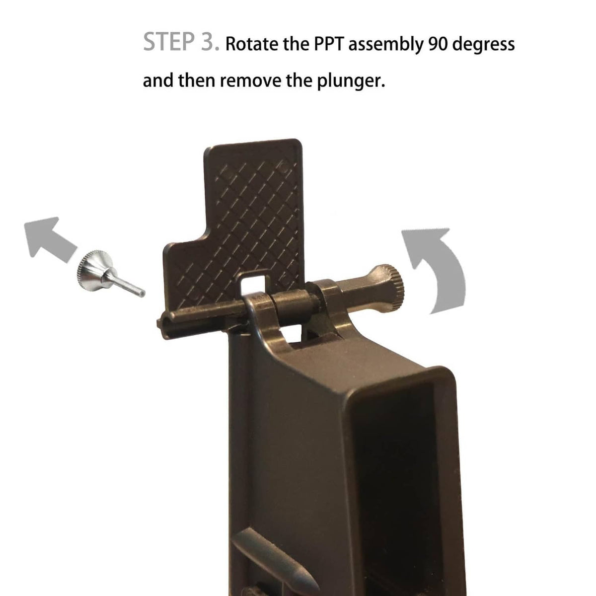 Pivot pin install tool rotated for removal; black textured plate and silver pin.