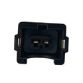 Black electrical connector housing with two metal pins for wiring harness