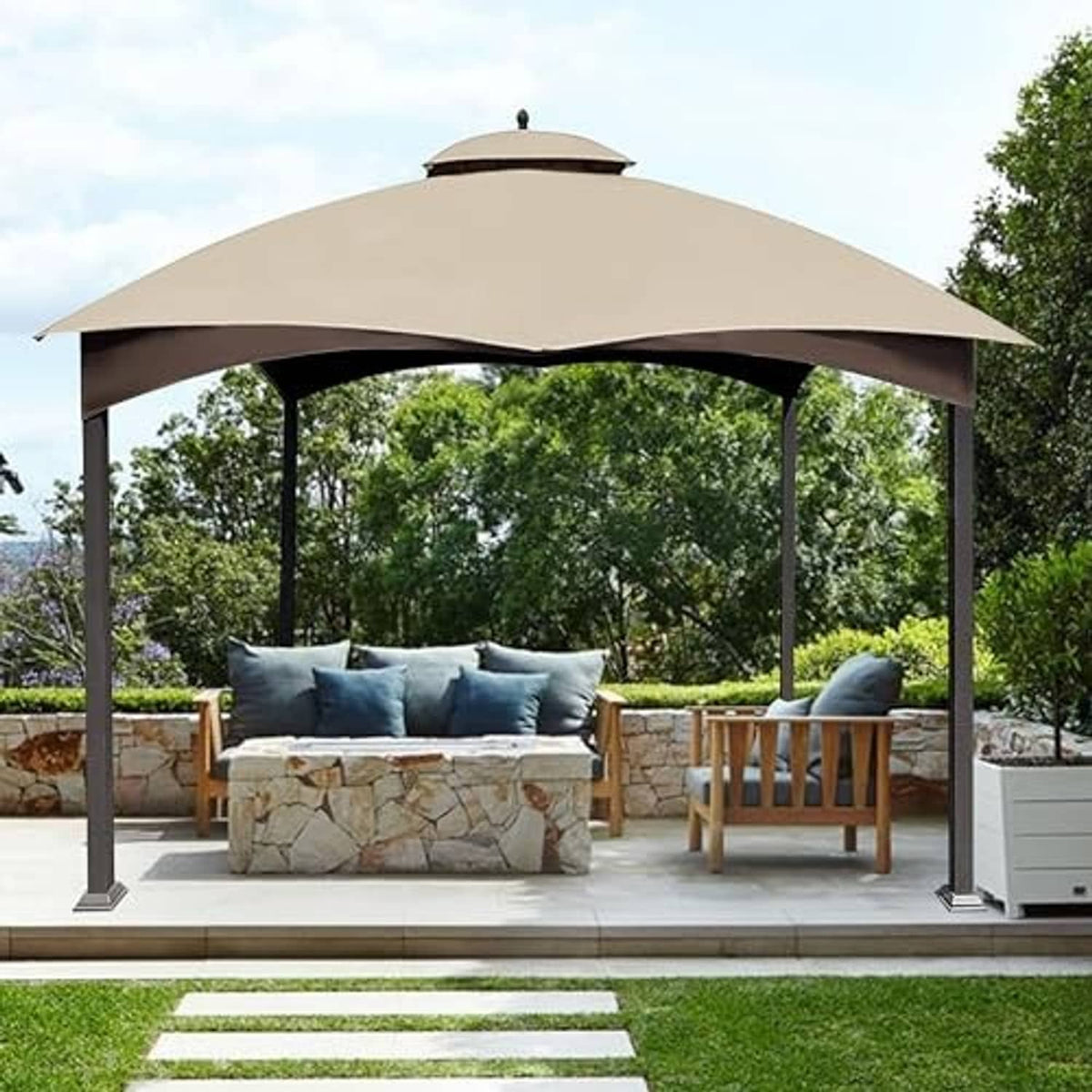 Light beige gazebo canopy top over an outdoor seating area with stone base