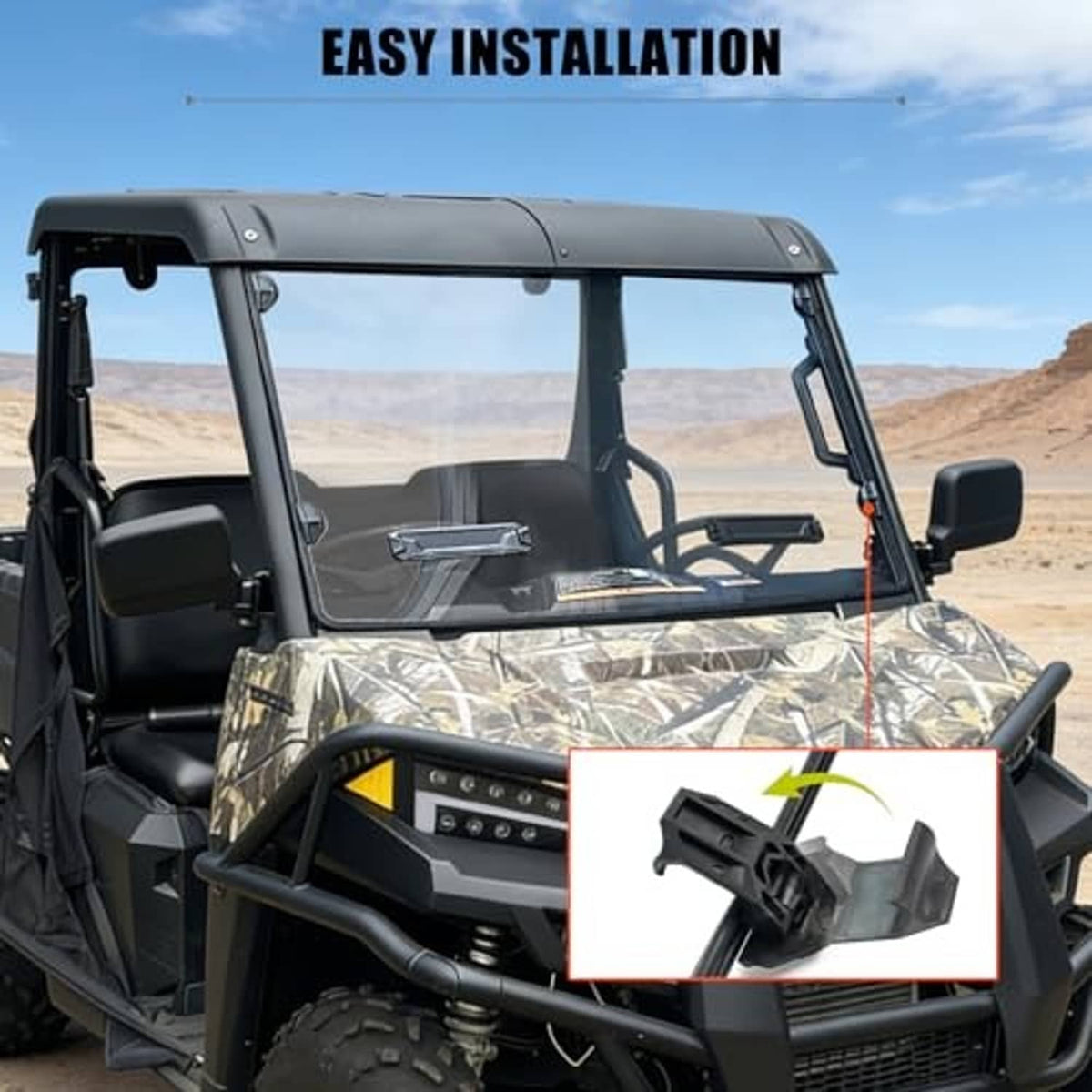 Front windshield installed on UTV cab with clear panel and black mounting frame