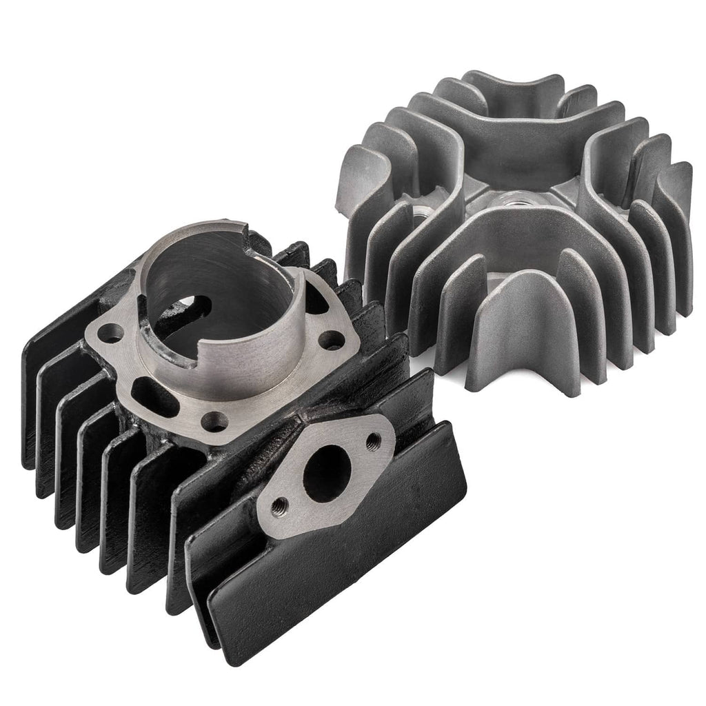 Close-up cylinder and cylinder head with cooling fins and piston opening