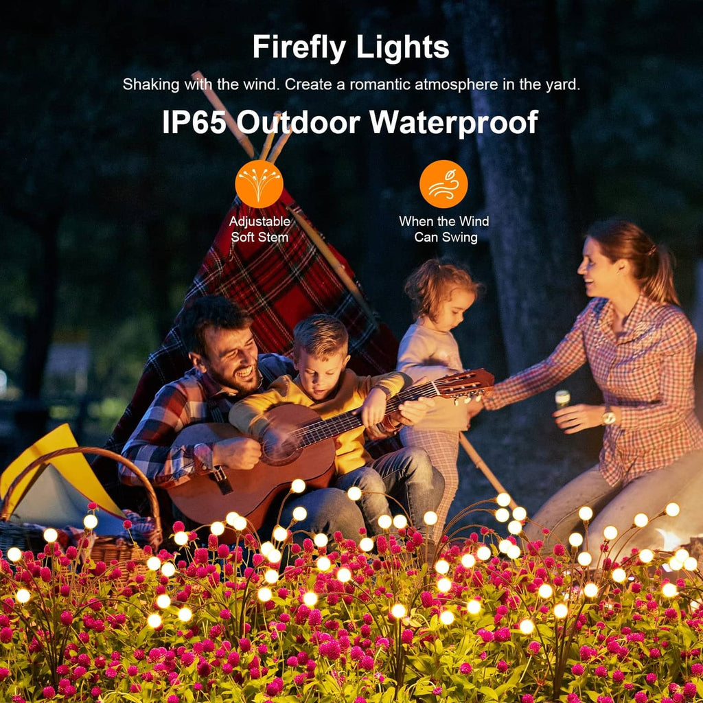 Outdoor solar garden lights glowing across flowers with round LED bulbs on stakes