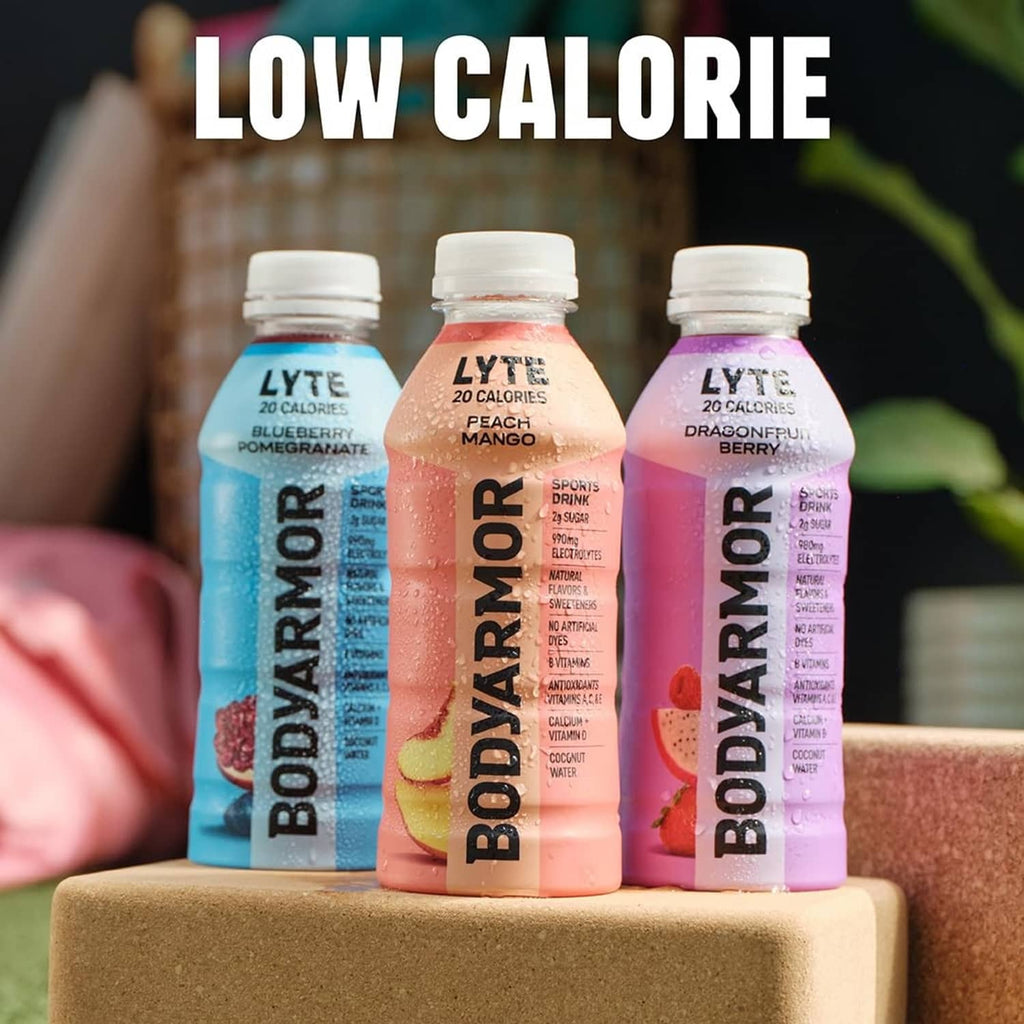 Low calorie sports drink bottles in blue, pink, and purple flavors