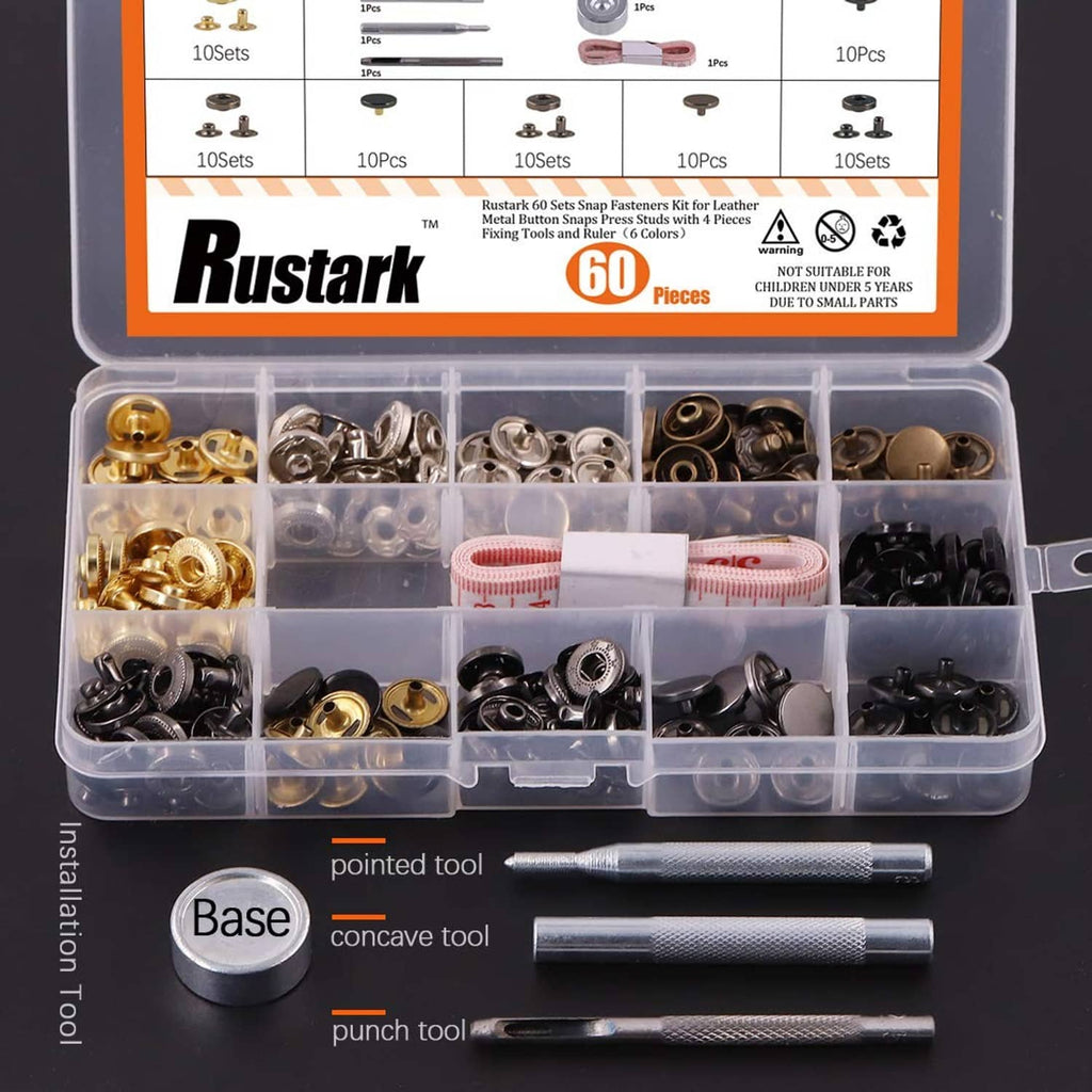 Snap fastener kit open organizer showing gold and black snaps with three metal tools
