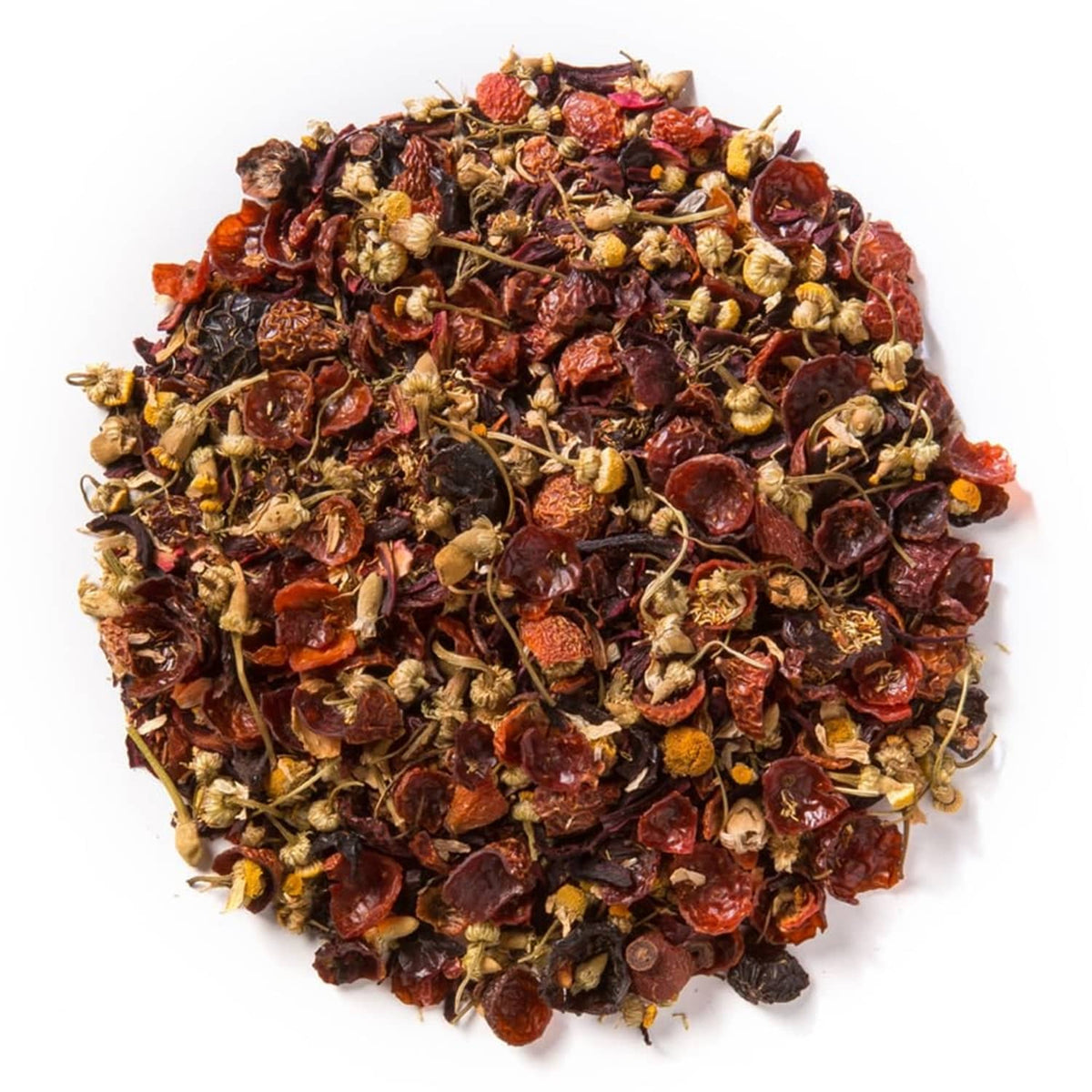 Loose leaf herbal berry essence tea blend in a pile with dried berry and herb pieces