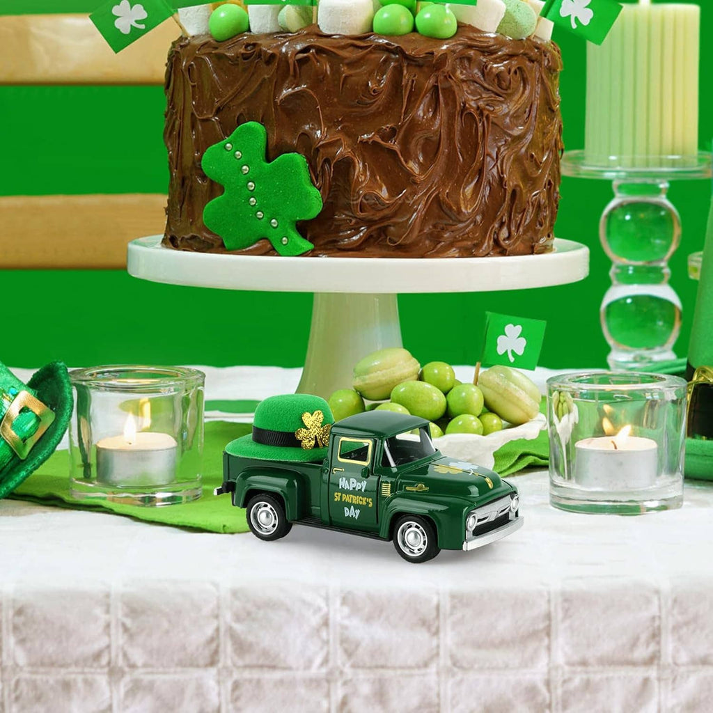 Green mini die-cast pickup with St. Patrick's Day print and green hat on party table