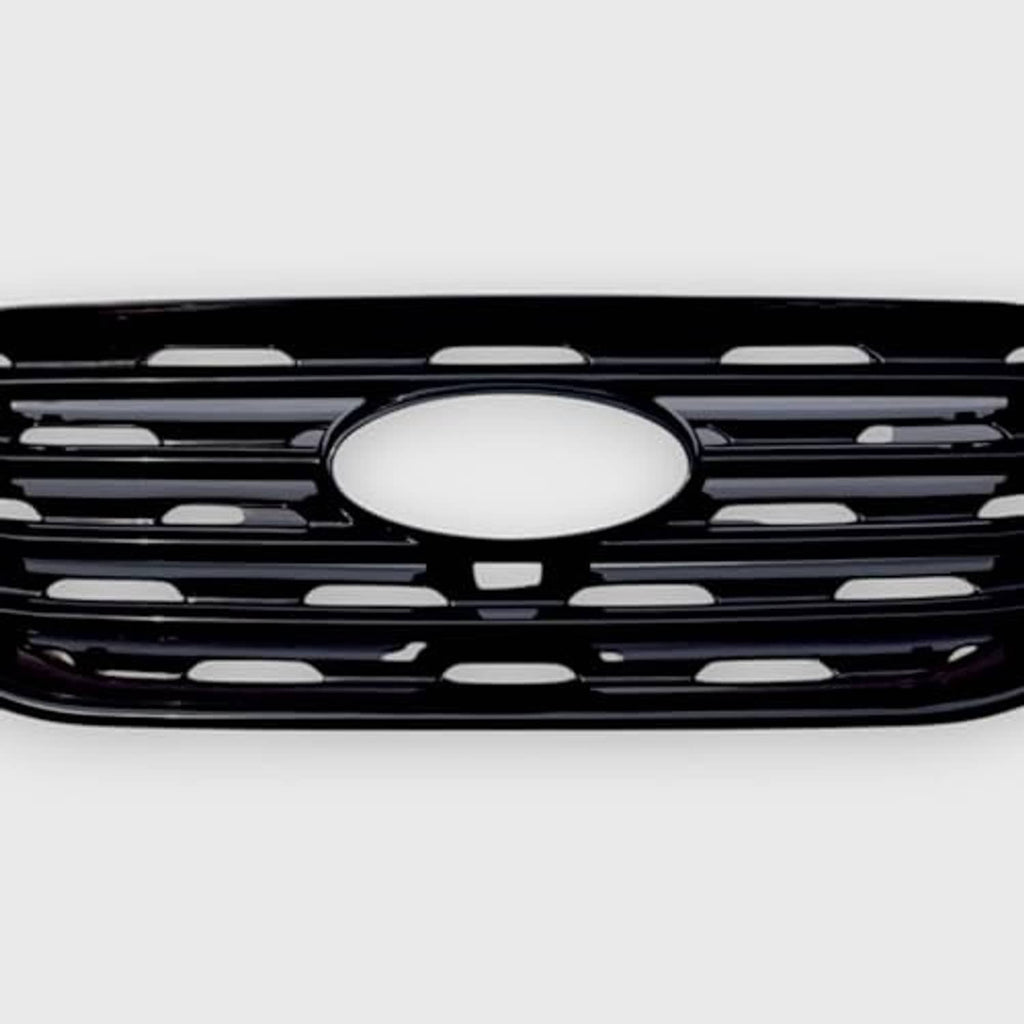 Front grille overlay view with gloss black slats and large round center emblem opening