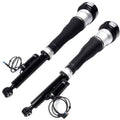 Rear air suspension strut set, two black and silver shock absorbers with wiring