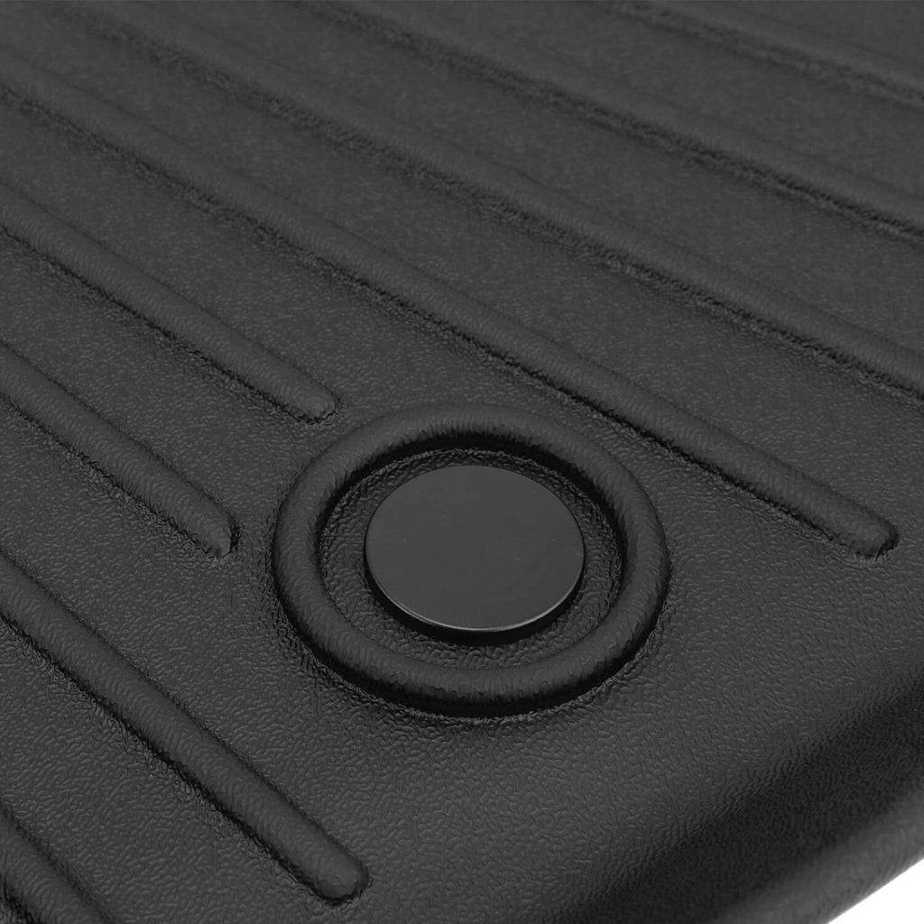 Waterproof cargo liner set with round access grommet on textured surface