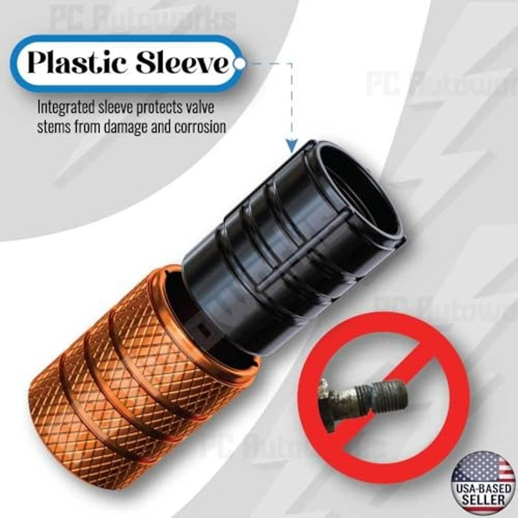 Orange anodized valve stem caps with black protective sleeve and valve opening