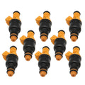 Set of 8 fuel injectors with orange top, black body, and yellow seals