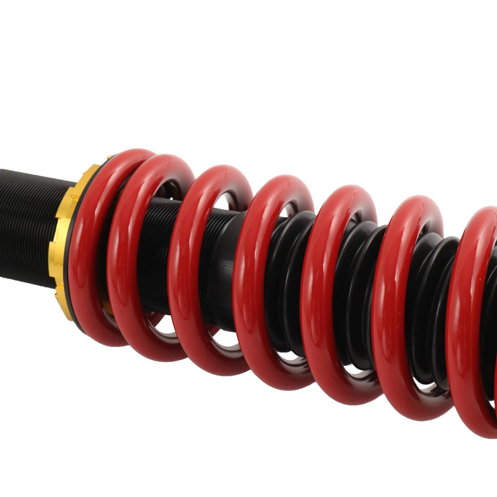 Red coil spring for adjustable coilover strut with black spring seat