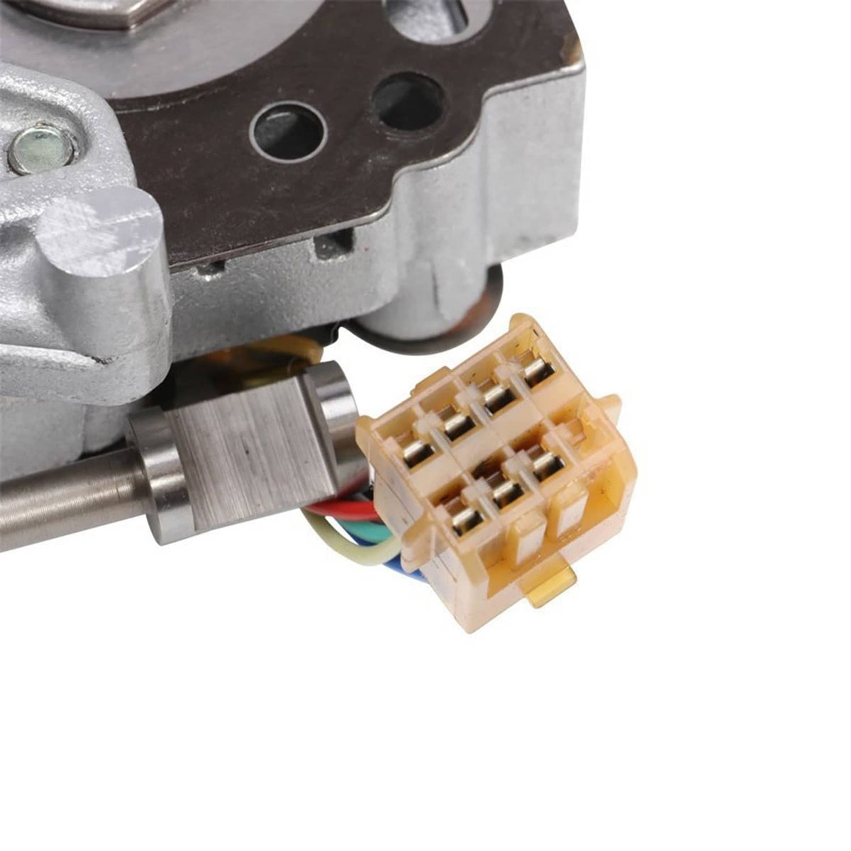 Transmission valve body close-up with yellow multi-pin electrical connector and wiring